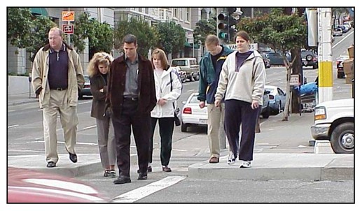 Photograph of median refuge island in which the area of the median where the crosswalk is located has been cut out to be level with the roadway.