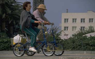 Photo of two older bicyclists
