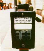 Figure 23-2. Pedestrian push-button hardware in Great Britain gives feedback regarding when to cross. 