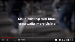 Screenshot of video reads Make existing mid-block crosswalks more visible.