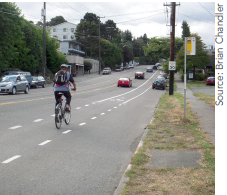 Road Diet with dedicated bike lanes and on-street parking on Nickerson Street, Seattle, WA. Source: Brian Chandler