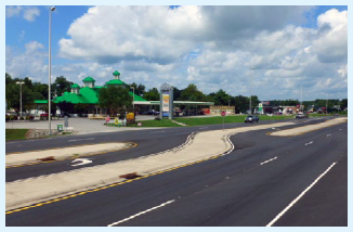 Artist's rendering of a J-turn intersection with a view from the right median showing a reduction in potential conflict points.