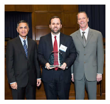 Victor Mendez and Tony Furst pose with Mark Cole after presenting an award to Virginia Department of Transportation for Deployment of HSIP Projects Using Virginia-Specific Safety Performance Functions.