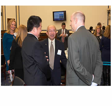 Blue Ribbon Judge Mike Griffith, Office of Safety Technologies, Federal Highway Administration (right) with Peter Hsu of FDOT (left)and Pei-Sung Lin of University of South Florida (center).