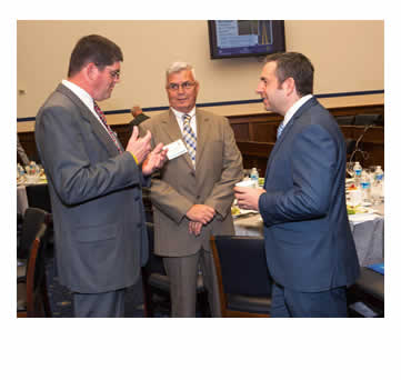 John Gianotti, TxDOT (left) and David Rodrigues, TxDOT (center) talk with Greg Cohen, RSF (right).