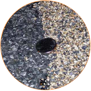 closeup of High Friction Surface Treatements, with standard pavement on the left and HFST on the right. A quarter is shown for scale