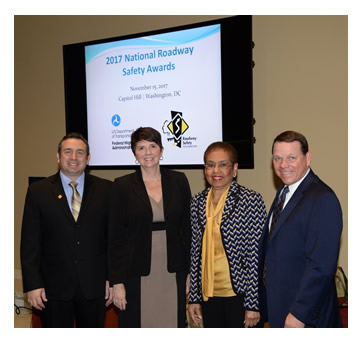 Photo: L-R: Greg Cohen, Roadway Safety Foundation Executive Director, Brandye L. Hendrickson, Federal Highway Administration Acting Administrator, House Highways & Transit Ranking Member Del. Eleanor Holmes Norton and House Highways & Transit Subcommittee Chairman Rep. Sam Graves.