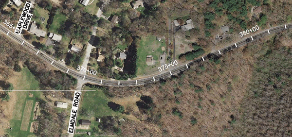Figure 9: Google Earth aerial photo at the intersection of Maplewood Drive and Elmdale Road with stationing information overlaid in white. (The stations depicted are 365+00, 370+00, 375+00 and 380+00 with increment markings inbetween.