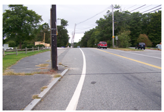 Photo of a vertical curve in a roadway.