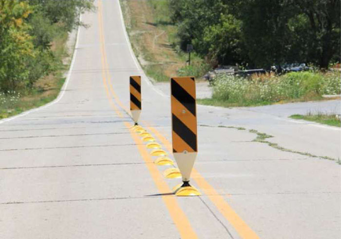 Figure 6-5 Removable traffic control device countermeasure installed in St Charles, IA (Image Source: Hallmark et al. 2013)