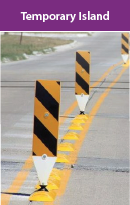 Temporary islands. A series of raised pavement markers are positioned on a double yellow centerline. Photo Source: Center for Transportation Research and Education (CTRE)
