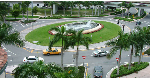 Aerial photo of a landscaped roundabout.