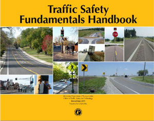 This figure shows a thumbnail-sized image of a landscape-oriented report cover. The title on the cover is "Traffic Safety Fundamentals Handbook." Below the title is a collage of roadway safety features including rumble strips, chevrons, a pedestrian crossing warning sign, a stop sign, a roundabout, and pedestrian signal heads. At the bottom of the cover is the Minnesota DOT logo.